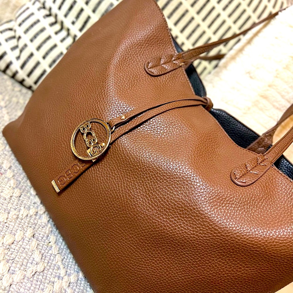 A brown BCBG Handbag, goes with everything and in almost new shape!